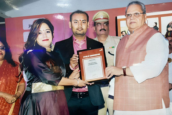 Getting Award by Governer Bihar